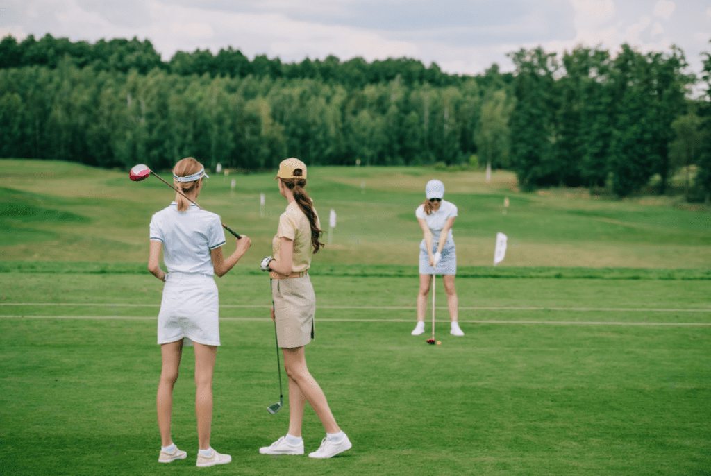 Girls playing golf